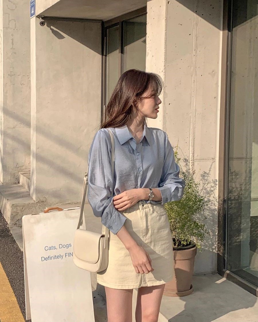 Bạn sẽ trông nữ tính hơn khi mix chân váy cùng áo sơ mi