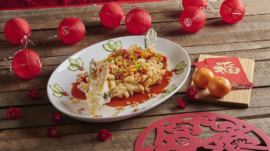 Cá - món ăn truyền thống không thể thiếu trên mâm cơm ngày Tết của người dân Singapore